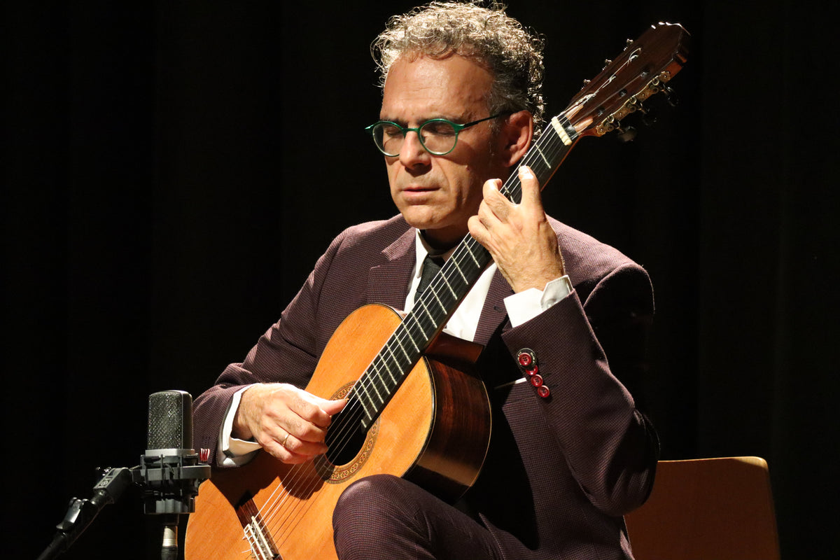 José Antonio Chic playing classical guitar