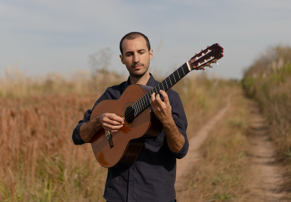 Nacho Eguía playing the classical guitar
